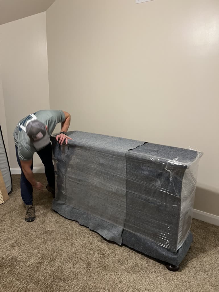 Padding and wrapping a dresser