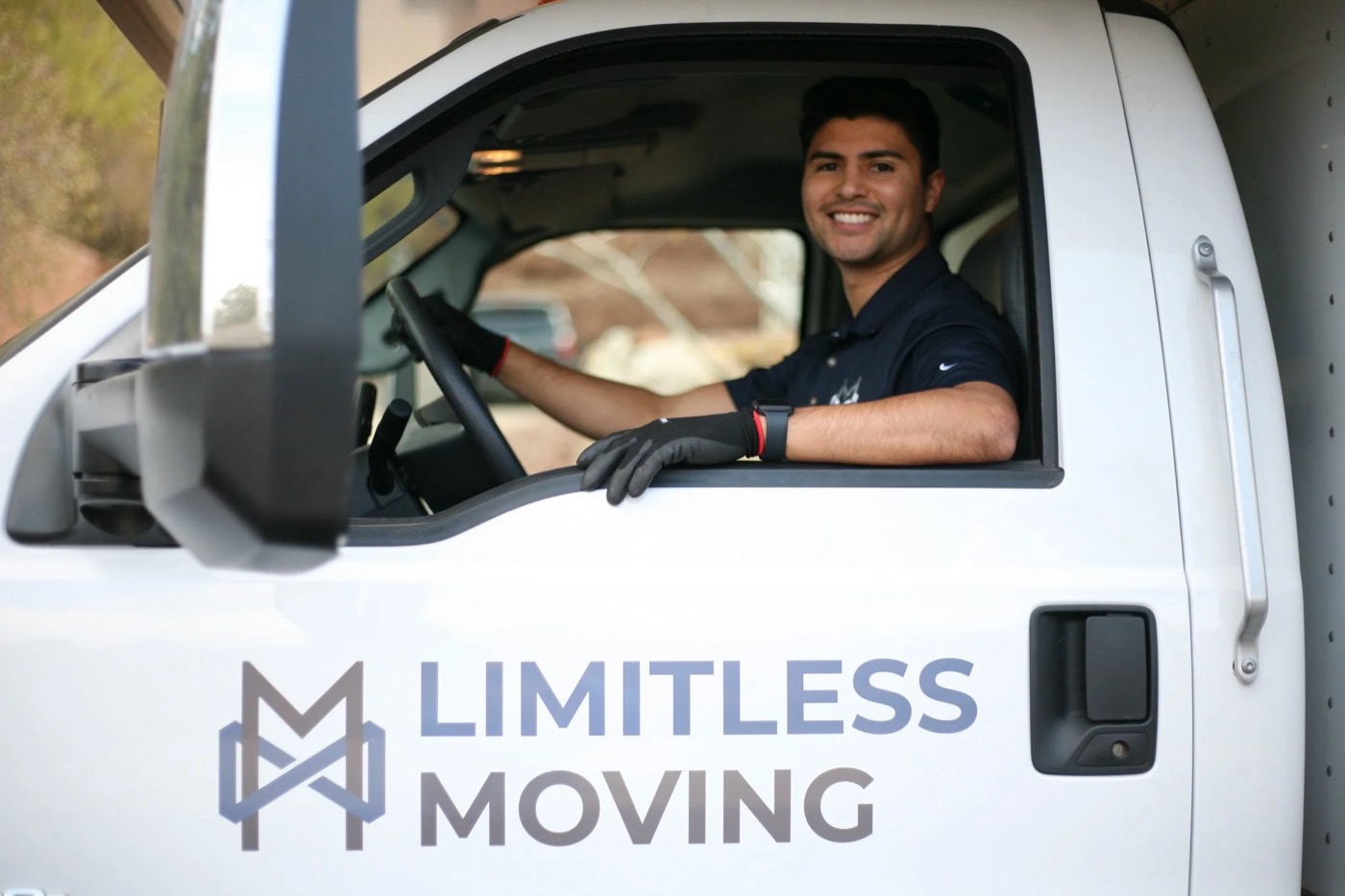 Limitless Moving driver in the truck cab
