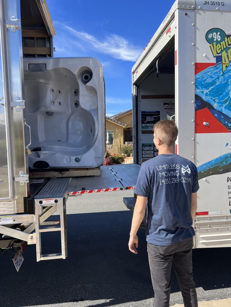 A hot tub coming off our truck lift